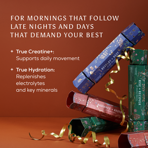 A promotional graphic for wellness gift christmas crackers on a warm brown background. White text on the left reads, 'FOR MORNINGS THAT FOLLOW LATE NIGHTS AND DAYS THAT DEMAND YOUR BEST' with bullet points about True Creatine+ and True Hydration.