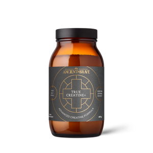 Amber glass jar from the Davina Ritual Gift Set, featuring a black lid and a black label with gold geometric designs and the text True Creatine+ Advanced Creatine Formula.