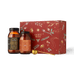 Two amber jars of Ancient + Brave collagen peptides and a gold measuring spoon positioned in front of a decorative red Rest Gift Set box.