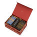 An open red Ancient + Brave Rise Gift Set containing a wellbeing set of electrolyte powder, collagen peptides, and a thin black box labeled The Ritual Scoop.