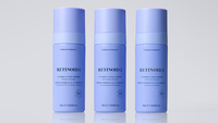Three blue skincare bottles labeled 'Retinoid 1', 'Retinoid 2', and 'Retinoid 3' on a light gray background.
