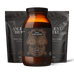 An amber glass jar of Ancient + Brave's True Collagen centered in front of two matching black resealable pouches on a black background. The jar has a black label with gold geometric artwork and text, and the pouches are also black with gold and white text.