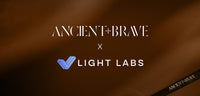 Collaboration between Ancient Brave and Light Labs on a brown background