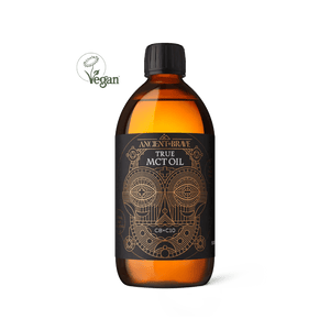 ANCIENT + BRAVE amber glass bottle containing their True MCT Oil made from ethically sourced coconut oil showing the front label of the bottle